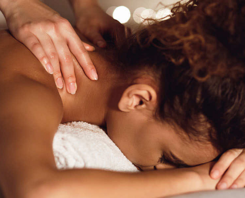client having a neck massage
