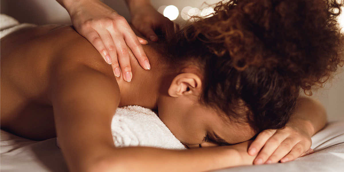 client having a neck massage